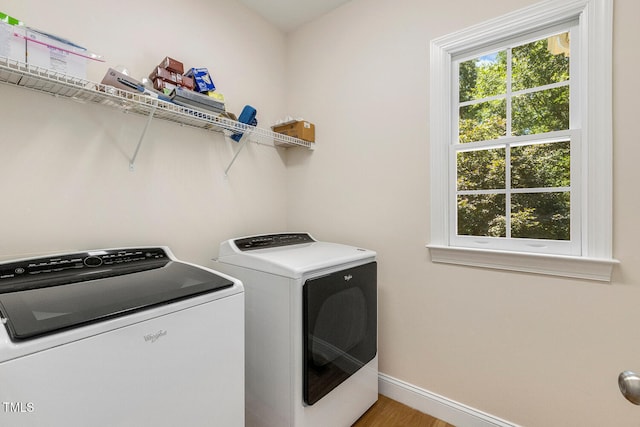 2628 Hunters Meadow Ln, Raleigh, NC 27606 - washroom featuring independent washer and dryer and light wood-type flooring