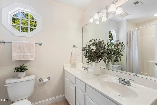 2628 Hunters Meadow Ln, Raleigh, NC 27606 - bathroom featuring double vanity and a shower with shower curtain