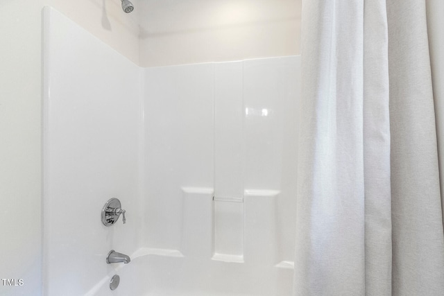 2628 Hunters Meadow Ln, Raleigh, NC 27606 - bathroom featuring shower / tub combo with curtain