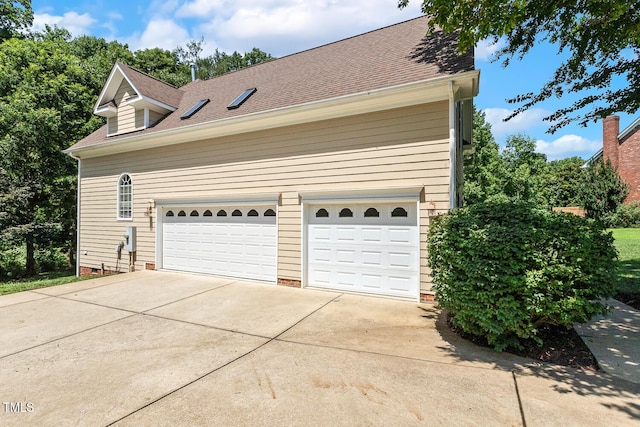 2628 Hunters Meadow Ln, Raleigh, NC 27606 - view of side of home featuring driveway and a shingled roof