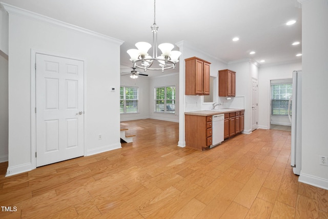 583 Old Home Place Ln, Durham, NC 27713 - kitchen featuring white appliances, a sink, a chandelier, crown molding, and light countertops