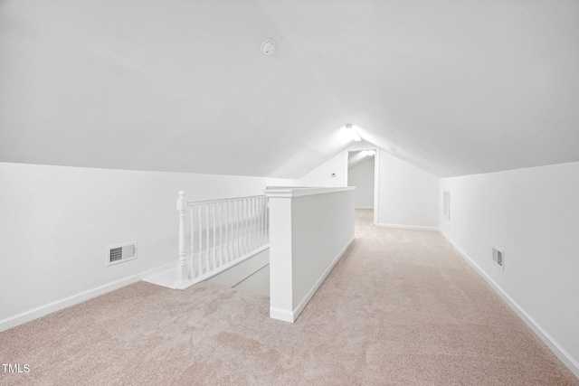 583 Old Home Place Ln, Durham, NC 27713 - additional living space featuring light colored carpet, vaulted ceiling, and baseboards
