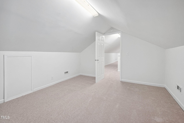 583 Old Home Place Ln, Durham, NC 27713 - additional living space with carpet, vaulted ceiling, and baseboards