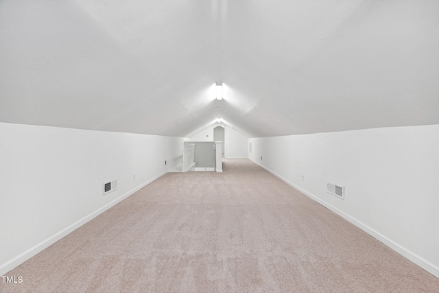 583 Old Home Place Ln, Durham, NC 27713 - additional living space with baseboards, light colored carpet, and lofted ceiling