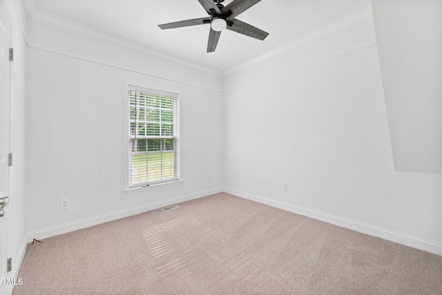 583 Old Home Place Ln, Durham, NC 27713 - spare room with ornamental molding, light colored carpet, a ceiling fan, and baseboards