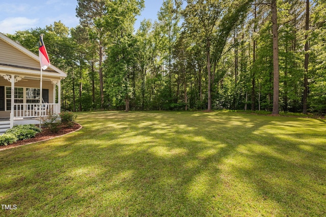 583 Old Home Place Ln, Durham, NC 27713 - view of grassy yard with covered porch