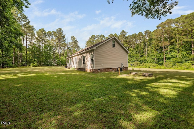 583 Old Home Place Ln, Durham, NC 27713 - view of home's exterior featuring crawl space and a yard