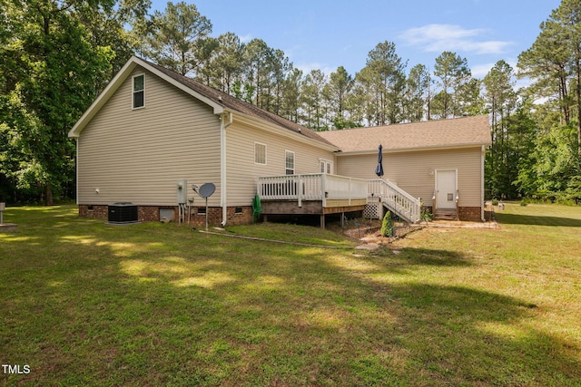 583 Old Home Place Ln, Durham, NC 27713 - back of house with crawl space, a lawn, a deck, cooling unit, and view of wooded area