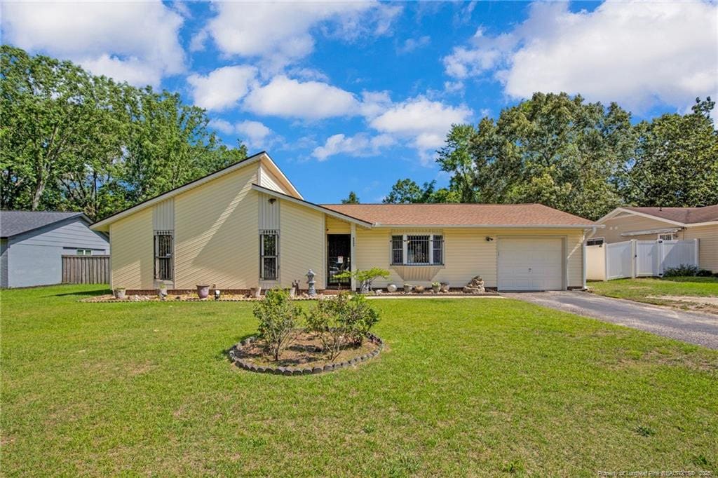 4809 Old Field Rd, Fayetteville, NC 28304 - view of front of house featuring driveway and a garage