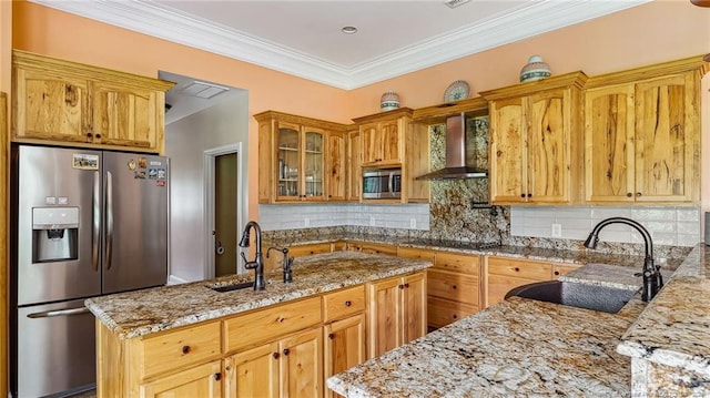 330 Wellington Rd, Saint Pauls, NC 28384 - kitchen with stainless steel appliances, wall chimney range hood, light stone countertops, glass insert cabinets, and backsplash