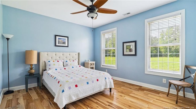 330 Wellington Rd, Saint Pauls, NC 28384 - bedroom featuring wood finished floors and ceiling fan