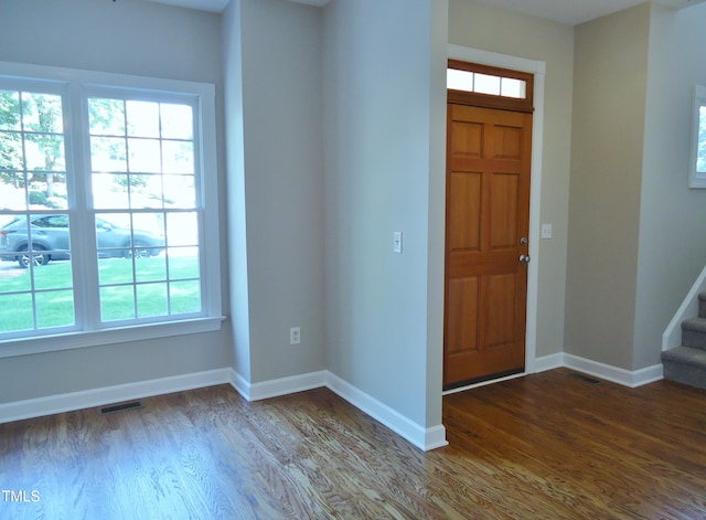 1104 Barrow Nook Ct, Apex, NC 27502 - entryway featuring wood finished floors, stairs, and baseboards