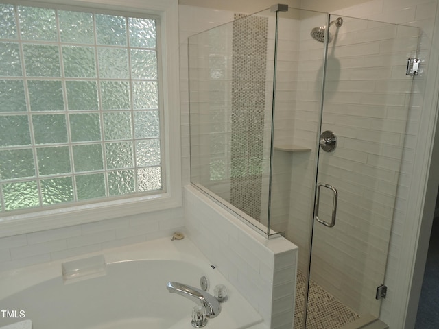1104 Barrow Nook Ct, Apex, NC 27502 - bathroom featuring a bath and a shower stall