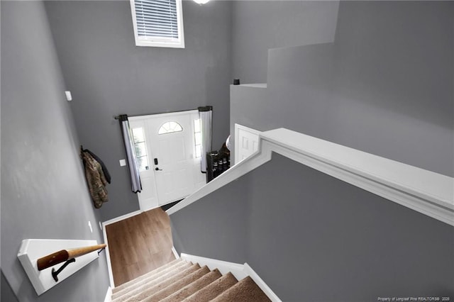 195 Cape Fear Rd, Raeford, NC 28376 - stairway with a high ceiling and wood finished floors