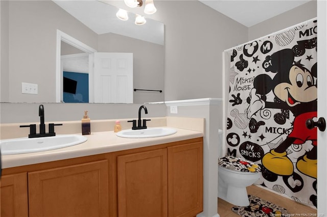 195 Cape Fear Rd, Raeford, NC 28376 - full bathroom with double vanity, toilet, and a shower with curtain