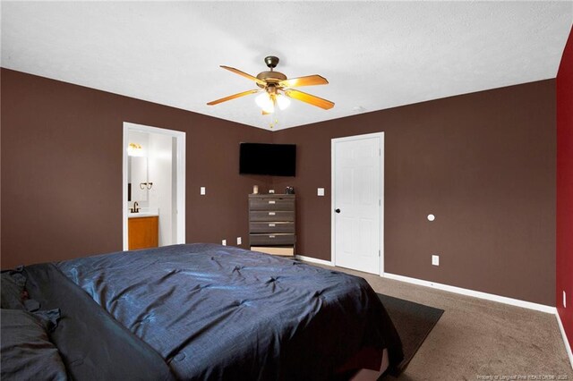 195 Cape Fear Rd, Raeford, NC 28376 - carpeted bedroom with baseboards, ensuite bathroom, and ceiling fan