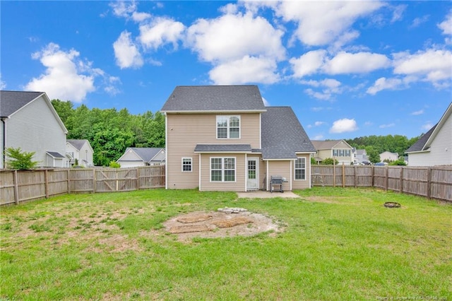 195 Cape Fear Rd, Raeford, NC 28376 - back of property with a patio and a fire pit