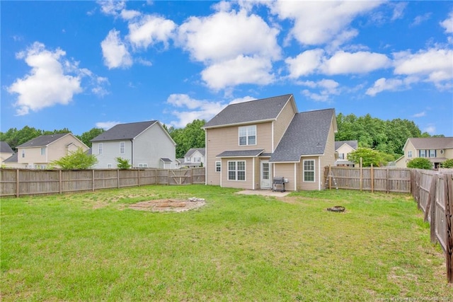 195 Cape Fear Rd, Raeford, NC 28376 - back of property with a fire pit, a patio area, and a residential view