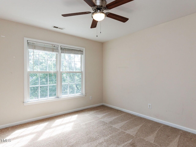 313 Hardwick Dr, Durham, NC 27713 - empty room with light colored carpet and ceiling fan
