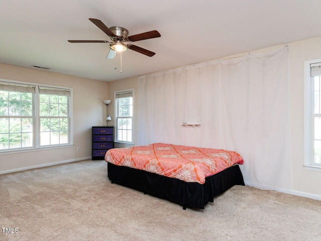 313 Hardwick Dr, Durham, NC 27713 - carpeted bedroom featuring baseboards and ceiling fan