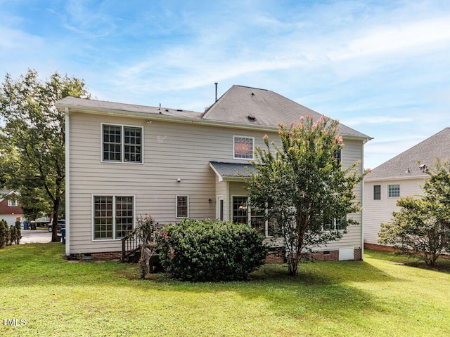 313 Hardwick Dr, Durham, NC 27713 - rear view of house featuring crawl space and a lawn
