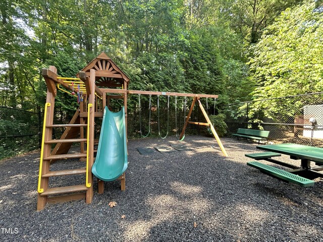313 Hardwick Dr, Durham, NC 27713 - view of play area featuring a wooded view