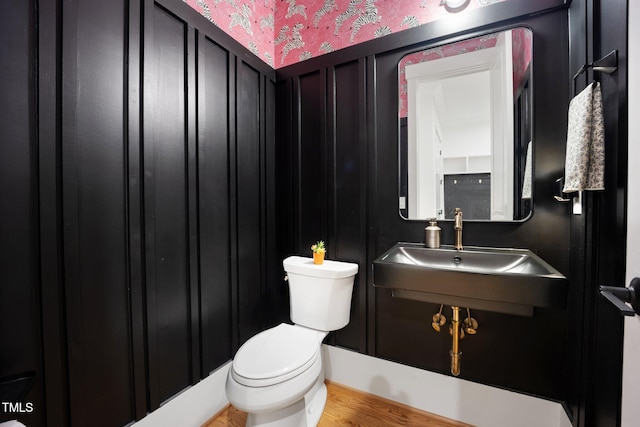 2713 Trifle Ln, Wake Forest, NC 27587 - bathroom featuring toilet, a sink, and wood finished floors