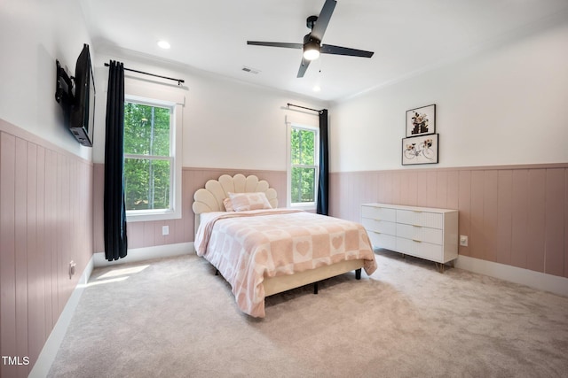 2713 Trifle Ln, Wake Forest, NC 27587 - carpeted bedroom with wainscoting, ceiling fan, and wooden walls