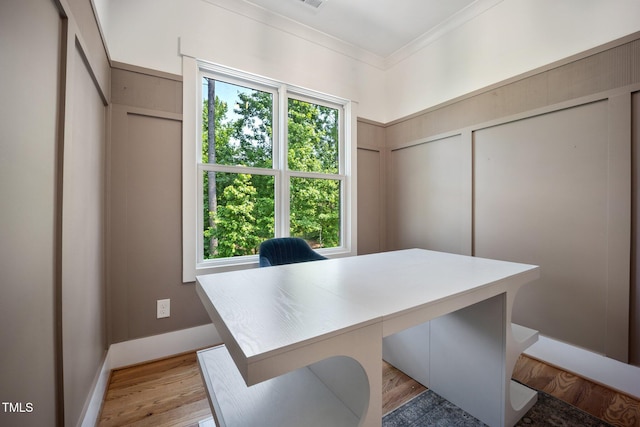 2713 Trifle Ln, Wake Forest, NC 27587 - office with a decorative wall, crown molding, and light wood-style flooring