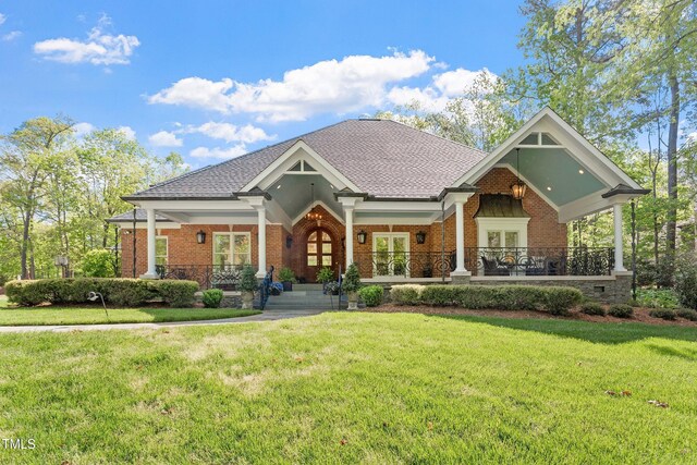801 Pinehurst Dr, Chapel Hill, NC 27517 - craftsman house with french doors, brick siding, and a front yard
