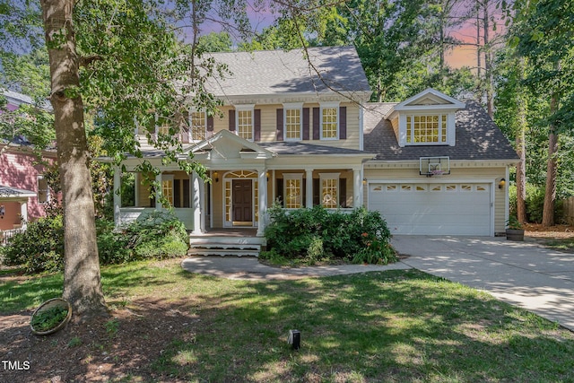 124 Cypress View Way, Apex, NC 27502 - view of front of home with covered porch, driveway, a garage, roof with shingles, and a lawn