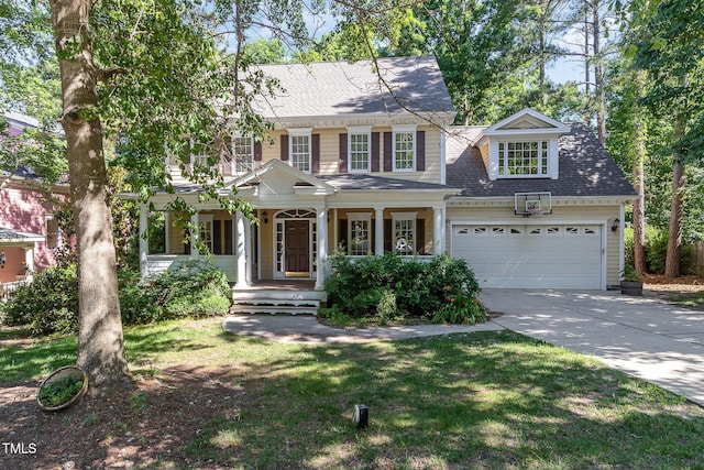 124 Cypress View Way, Apex, NC 27502 - view of front facade with a porch, driveway, an attached garage, a shingled roof, and a front yard