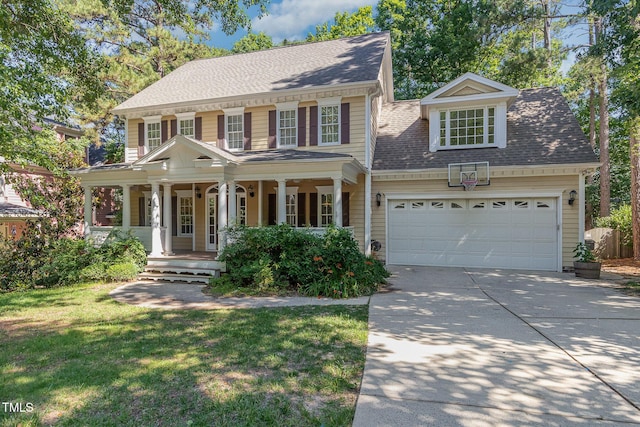 124 Cypress View Way, Apex, NC 27502 - view of front of home featuring a porch, driveway, a garage, roof with shingles, and a front yard