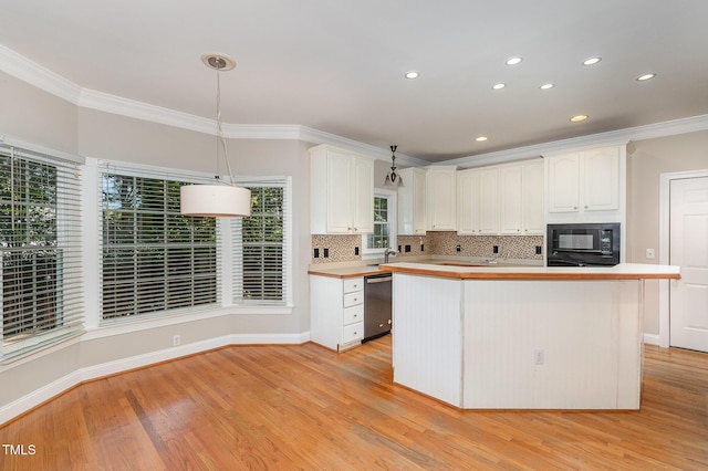 124 Cypress View Way, Apex, NC 27502 - kitchen featuring black microwave, dishwasher, crown molding, light wood-style flooring, and white cabinetry