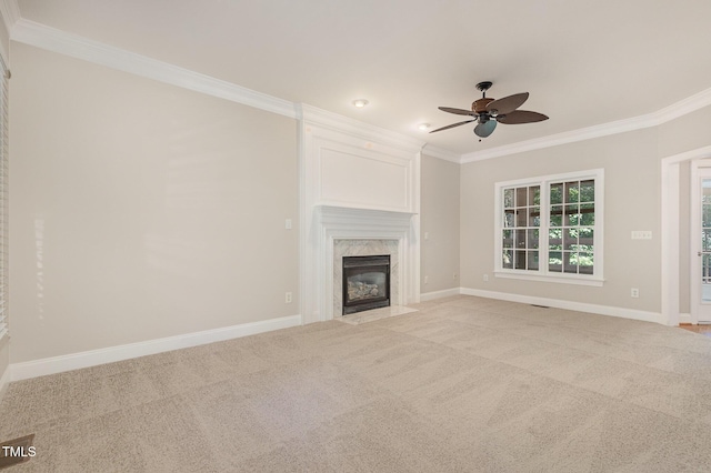 124 Cypress View Way, Apex, NC 27502 - unfurnished living room with crown molding, ceiling fan, light colored carpet, a high end fireplace, and baseboards
