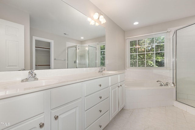 124 Cypress View Way, Apex, NC 27502 - bathroom with a shower stall, double vanity, a garden tub, and recessed lighting