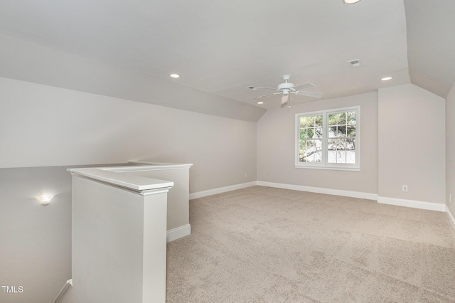 124 Cypress View Way, Apex, NC 27502 - additional living space featuring vaulted ceiling, recessed lighting, a ceiling fan, light carpet, and baseboards