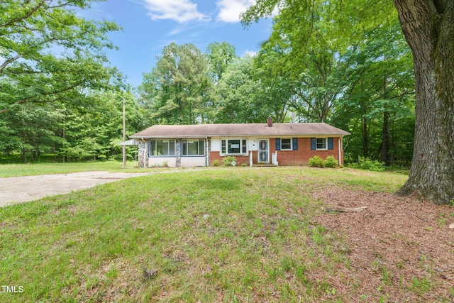 211 Cool Spring Rd, Durham, NC 27713 - ranch-style home featuring brick siding, a front yard, and a chimney