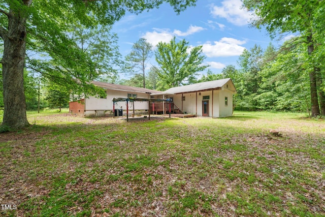 211 Cool Spring Rd, Durham, NC 27713 - rear view of property with a wooden deck and a lawn