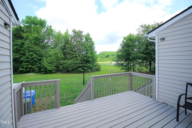 1806 Stroll Cir, Fuquay Varina, NC 27526 - wooden deck with a yard