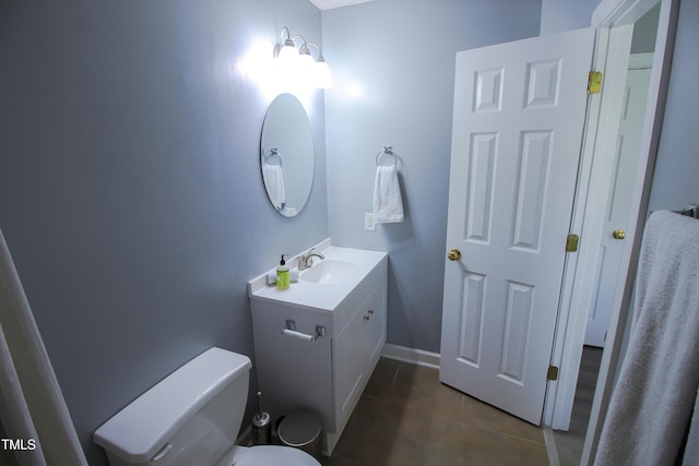 1806 Stroll Cir, Fuquay Varina, NC 27526 - bathroom featuring vanity, tile patterned flooring, toilet, and baseboards