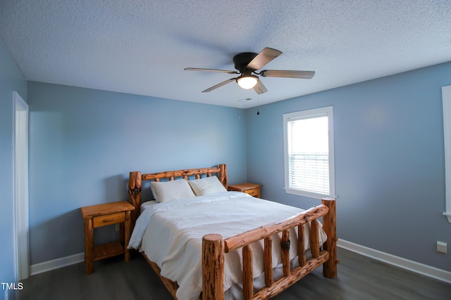 1806 Stroll Cir, Fuquay Varina, NC 27526 - bedroom with wood finished floors, baseboards, a textured ceiling, and ceiling fan