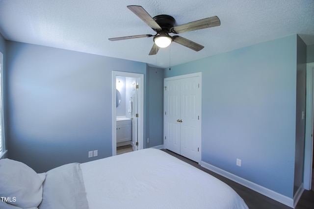 1806 Stroll Cir, Fuquay Varina, NC 27526 - bedroom with baseboards, a textured ceiling, a closet, ensuite bathroom, and ceiling fan