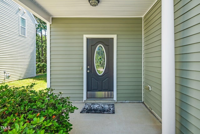 4009 Patriot Ridge Ct, Raleigh, NC 27610 - view of exterior entry with a porch