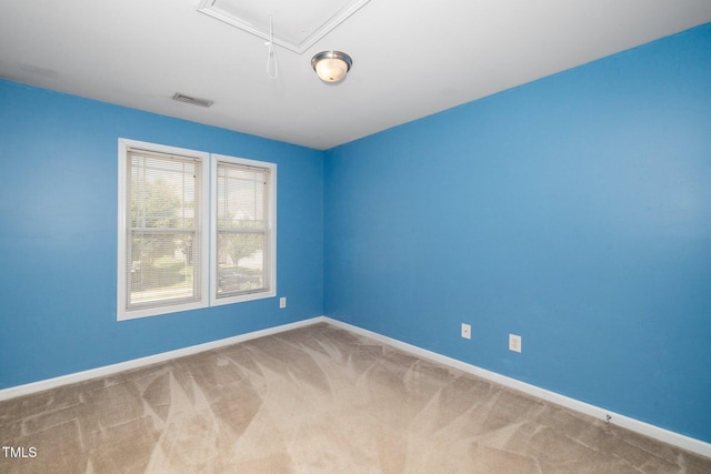 4009 Patriot Ridge Ct, Raleigh, NC 27610 - carpeted spare room with attic access and baseboards