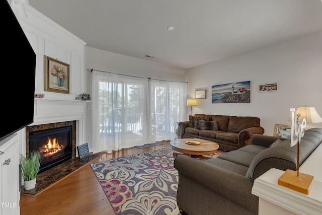 3400 Secretariat Way, Raleigh, NC 27614 - living area featuring a fireplace and wood finished floors
