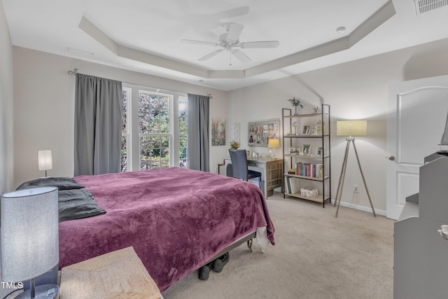 3400 Secretariat Way, Raleigh, NC 27614 - bedroom with a tray ceiling, light colored carpet, baseboards, and ceiling fan