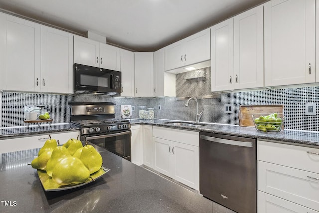 1420 Seabrook Ave, Cary, NC 27511 - kitchen with stainless steel appliances, white cabinets, decorative backsplash, and a sink