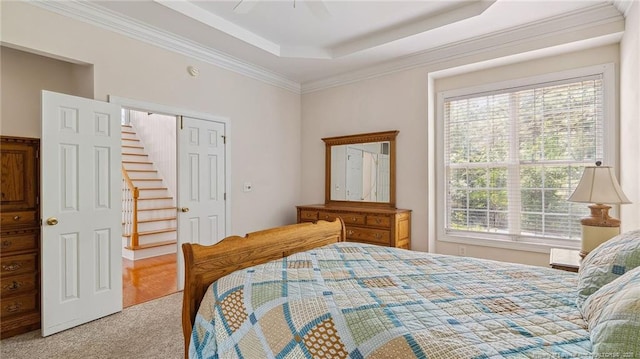 202 Juniper Creek Blvd, Pinehurst, NC 28374 - carpeted bedroom featuring a raised ceiling and crown molding