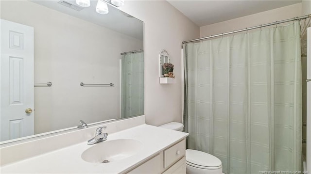 202 Juniper Creek Blvd, Pinehurst, NC 28374 - full bath with toilet, vanity, and a shower with shower curtain